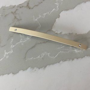 Cream enamel barrette by Sylvain le Hen